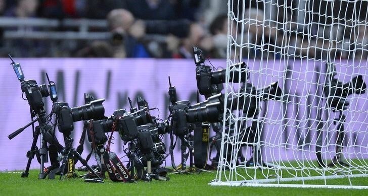 Remote cameras placed by photographers are seen behind the San Marino goal during their World Cup 2014 qualifying soccer match against England at Wembley Stadium in London October 12, 2012. REUTERS/Toby Melville (BRITAIN - Tags: SPORT SOCCER)