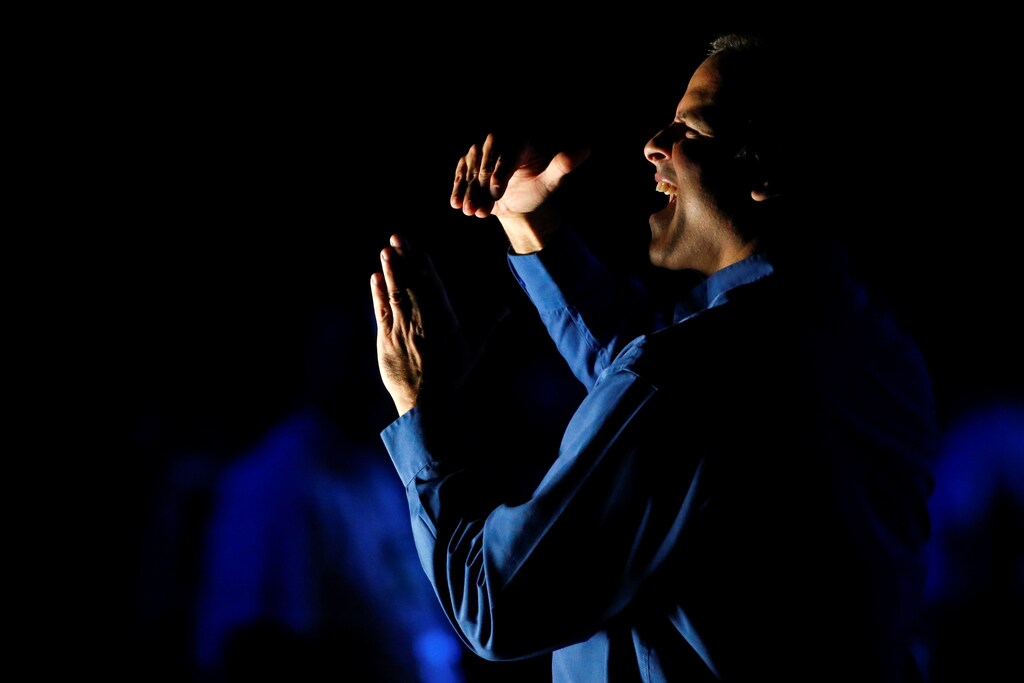 A sign language interpreter is pictured as singer James Blunt performs during the opening ceremony of the Invictus Games in Orlando Florida, U.S., May 8, 2016. REUTERS/Carlo Allegri - S1AETCZQJYAA