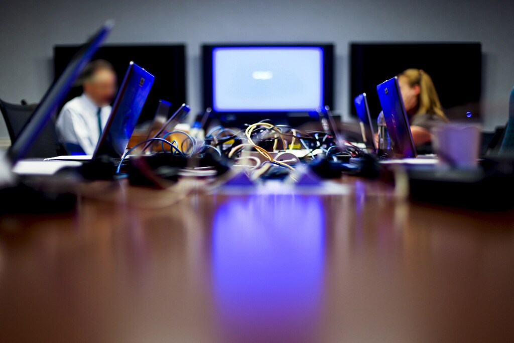 Interconnected laptop computers are pictured on a conference table in this handout photograph taken on June 13, 2012 and provided on April 28, 2015. To match Special Report USA-MEDICAID/FRAUD REUTERS/U.S. Department of Health and Human Services Office of the Inspector General/Handout via ReutersATTENTION EDITORS - THIS PICTURE WAS PROVIDED BY A THIRD PARTY. REUTERS IS UNABLE TO INDEPENDENTLY VERIFY THE AUTHENTICITY, CONTENT, LOCATION OR DATE OF THIS IMAGE. FOR EDITORIAL USE ONLY. NOT FOR SALE FOR MARKETING OR ADVERTISING CAMPAIGNS. THIS PICTURE IS DISTRIBUTED EXACTLY AS RECEIVED BY REUTERS, AS A SERVICE TO CLIENTS. PICTURE DIGITALLY ALTERED AT SOURCE. - RTX1ATK8