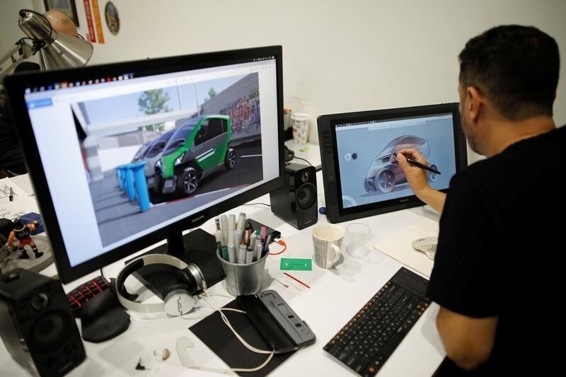 A designer works on his computer in the offices of City Transformer in Kfar Netter, near Tel Aviv, Israel November 20, 2018. Picture taken November 20, 2018. REUTERS/Amir Cohen - RC17648754D0