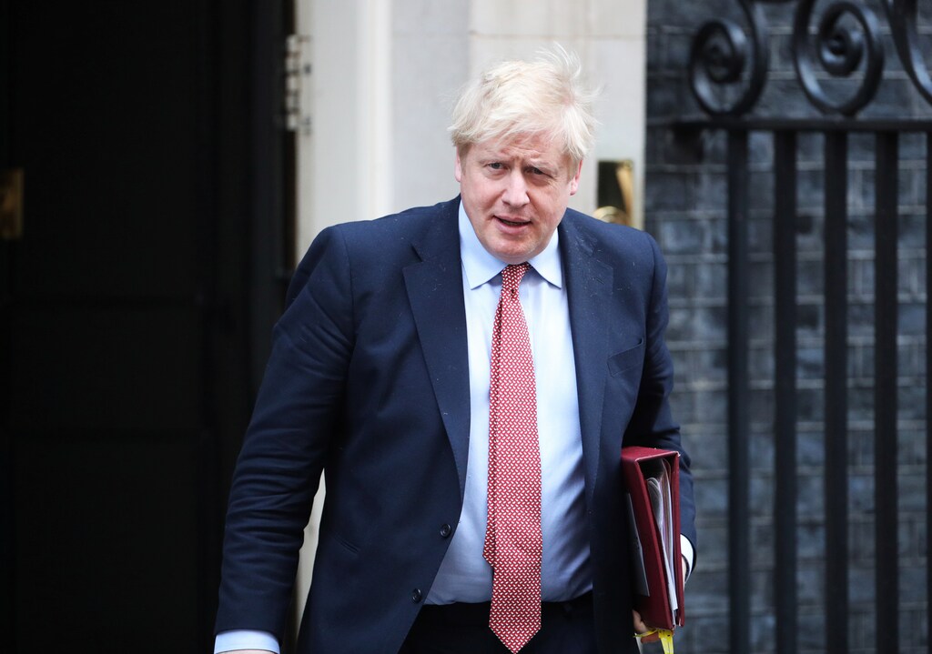 Britain's Prime Minister Boris Johnson leaves Downing Street, as the spread of coronavirus disease (COVID-19) continues. London, Britain, March 25, 2020. REUTERS/Hannah Mckay - RC2ZQF9HXTEV