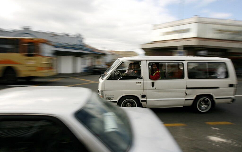 August 15, 2007. Armed with pistols and fiery tempers, South Africa's minibus taxi drivers are the undisputed kings of road rage, cutting people off and flying through redlights as nervous motorists clear the way. To match feature SAFRICA-TAXIS/ REUTERS/Mike Hutchings (SOUTH AFRICA) - PM1DVYCUZKAA