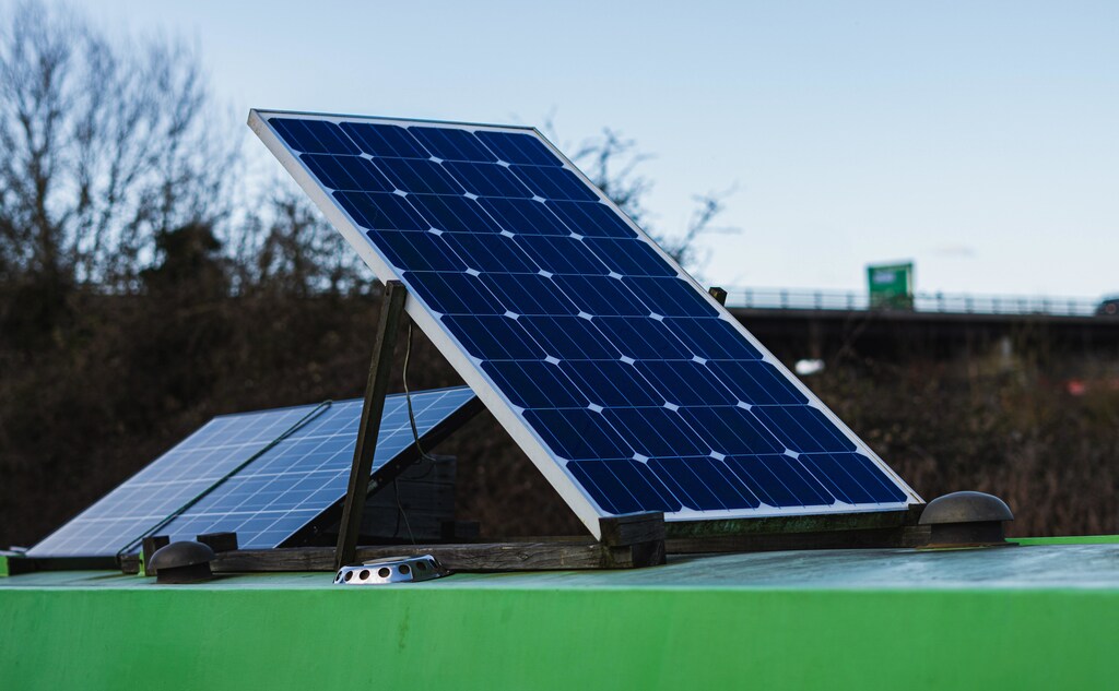 Pictured is a solar panel on top of a roof.