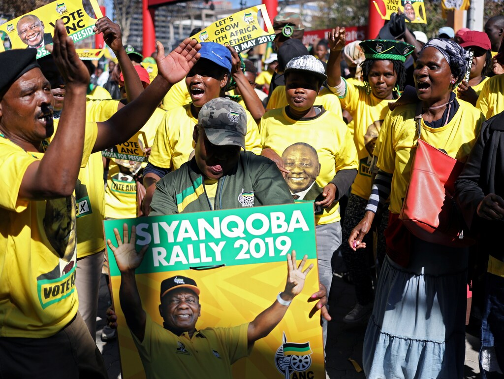 Supporters of President Cyril Ramaphosa's ruling party African National Congress (ANC) sing and dance at the party's final election rally ahead of the country's May 8 poll, in Johannesburg, South Africa, May 5, 2019. REUTERS/Siphiwe Sibeko - RC1F761176A0