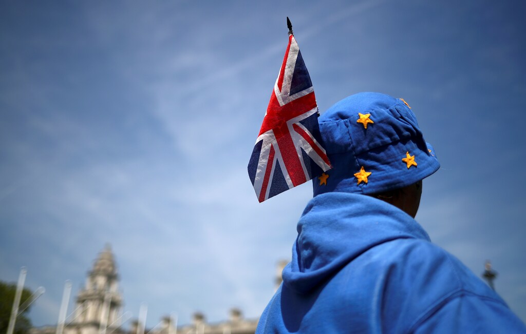 An anti-Brexit protester is pictured outside the Houses of Parliament in London, Britain May 15, 2019. REUTERS/Hannah Mckay