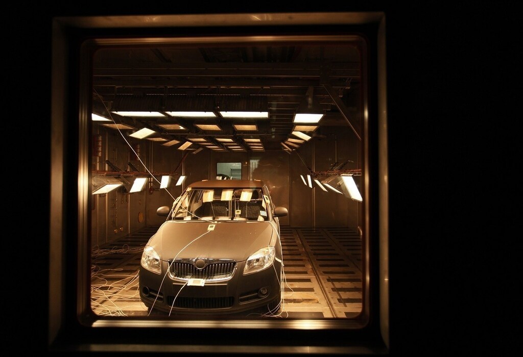 The Skoda Fabia car is seen in a test room exposed to high temperatures simulating the sun shining in the Skoda Auto Technological Center in Mlada Boleslav, December 14, 2010. REUTERS/Petr Josek (CZECH REPUBLIC - Tags: BUSINESS TRANSPORT EMPLOYMENT) - RTXVPQ8