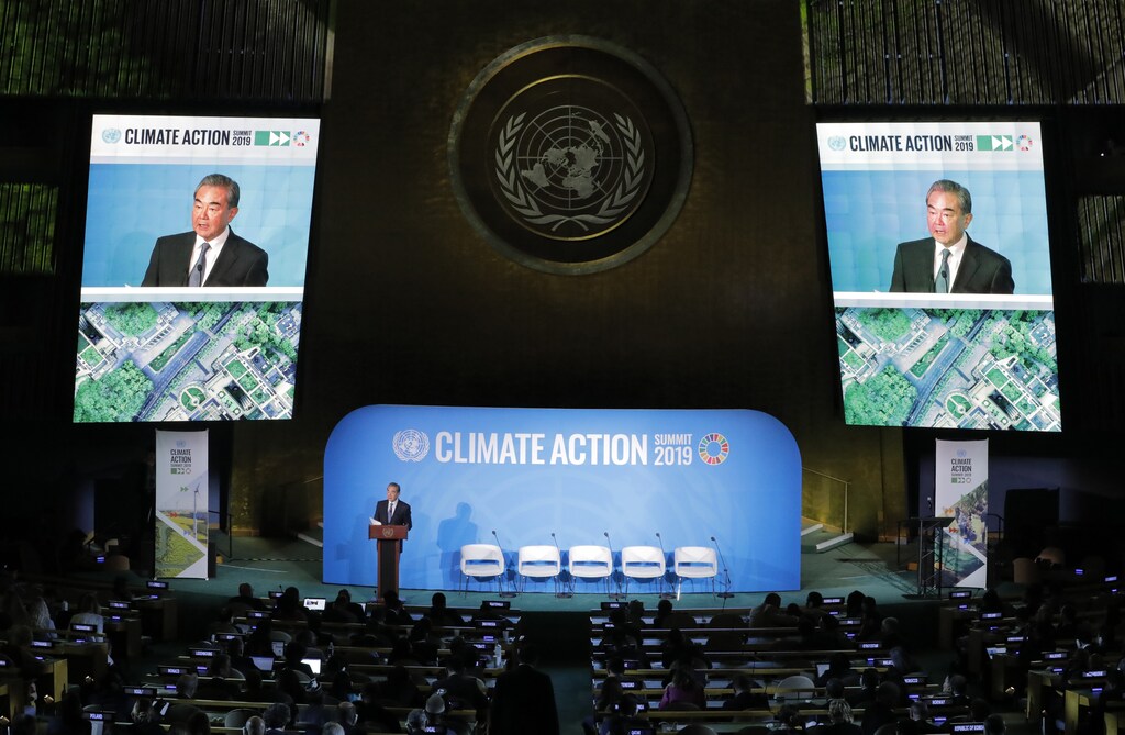 China's State Councilor and Special Representative Wang Yi speaks during the 2019 United Nations Climate Action Summit at U.N. headquarters in New York City, New York, U.S. environment renewable solar energy change transition friendly environment carbon footprint carbon emissions reduction change natural climate change global warming air pollution clean energy power renewables plastic plastics