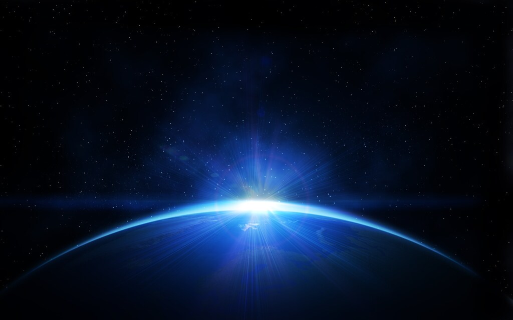 stock pic of the top silouhette of a planet in space