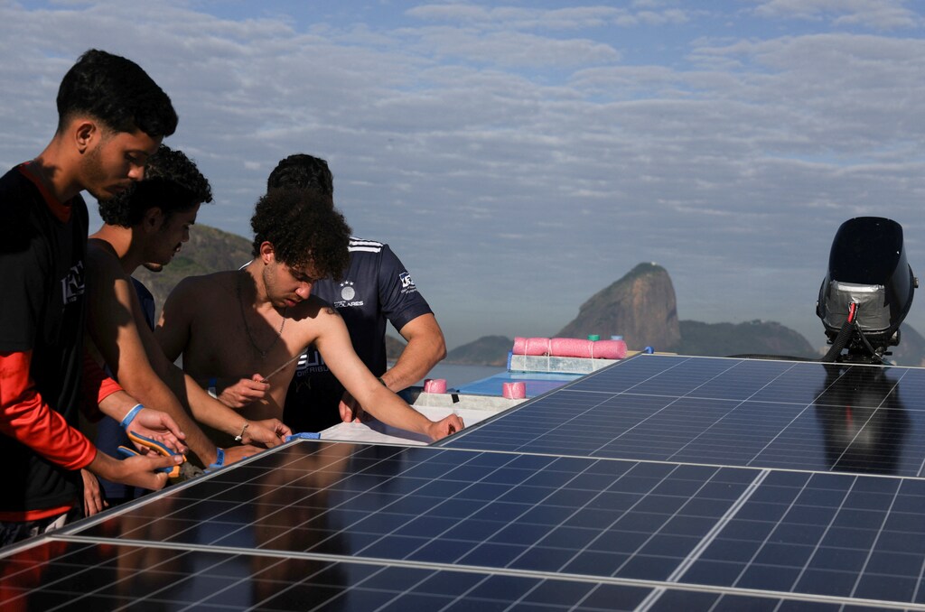 University students prepare their boat as they take part in a solar boat competition during the "Desafio Sol e Mar" (Sun and Sea challenge) in Niteroi, near Rio de Janeiro, Brazil June 20, 2025: Energy innovation must balance three often-conflicting goals: security, equity and sustainability.
