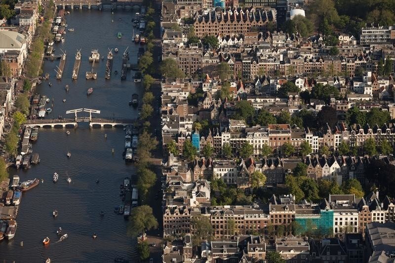 The Amstel river is pictured in this aerial shot of Amsterdam, Netherlands, June 14, 2017. REUTERS/Cris Toala Olivares - RC1CF18BA100