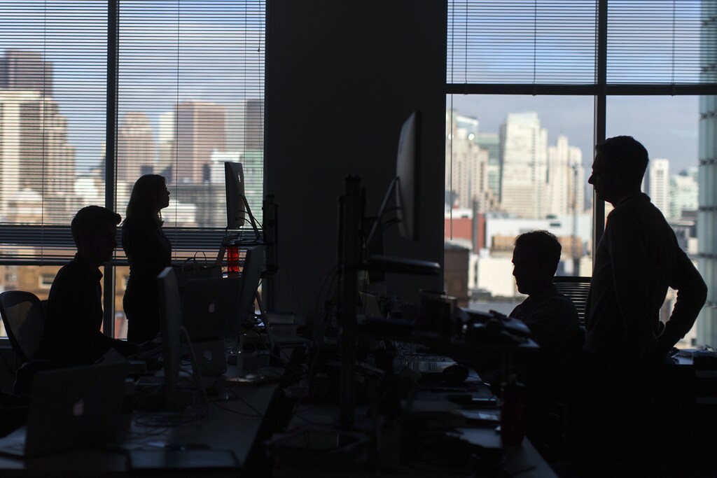 Employees work inside the Minerva Project office in San Francisco, California January 7, 2014.