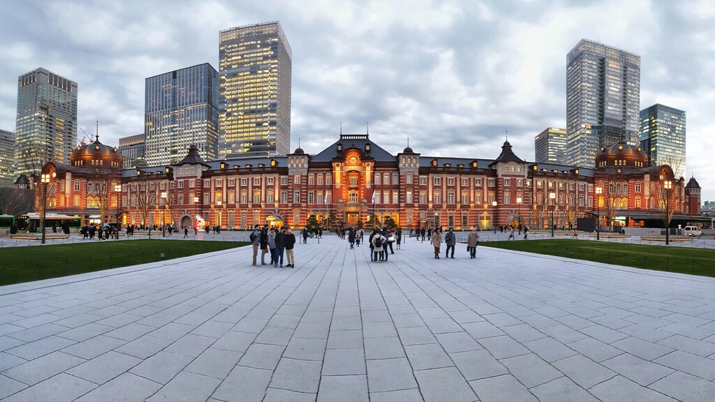 A group of people standing in front of Tokyo station inn Japan: Japan and the Middle East seek to strengthen economic and diplomatic ties.