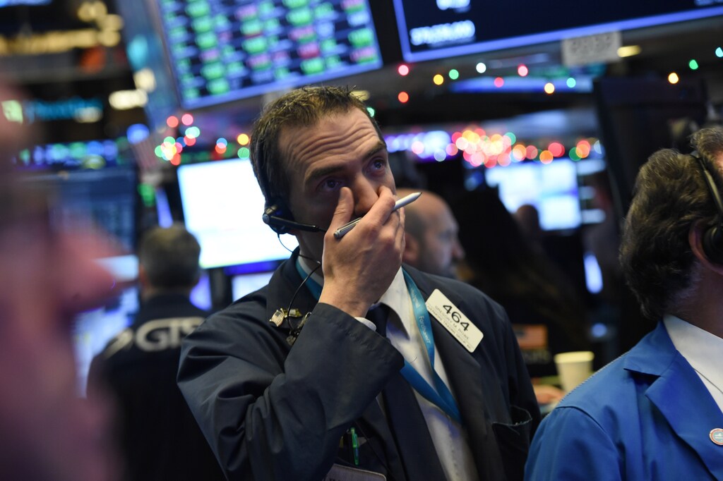 A trader looks on while waiting for the initial price of Tencent Music Entertainment company's IPO on the floor of the New York Stock Exchange (NYSE) in New York, U.S., December 12, 2018. REUTERS/Bryan R Smith - RC1EF1F35FC0