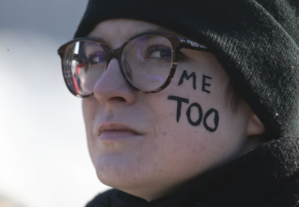 A participant attends a rally, held to support women's rights and to protest against violence towards women, in Saint Petersburg, Russia March 8, 2019. REUTERS/Anton Vaganov - UP1EF3810KO0K
