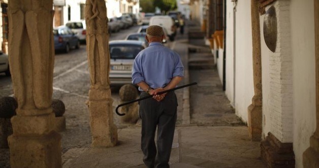 A pensioner walks through the “Templete de la Virgen de los Dolores” (Shrine of Virgin of Sorrows) monument in downtown Ronda, near Malaga, southern Spain May 9, 2013.