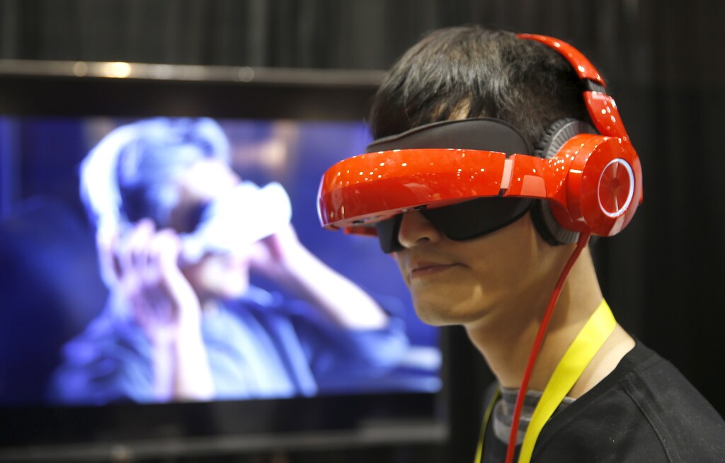 Eric Yu of Royole models the company's foldable Smart Mobile Theater system during "CES Unveiled," a preview event of the 2016 International CES trade show, in Las Vegas, Nevada January 4, 2016.