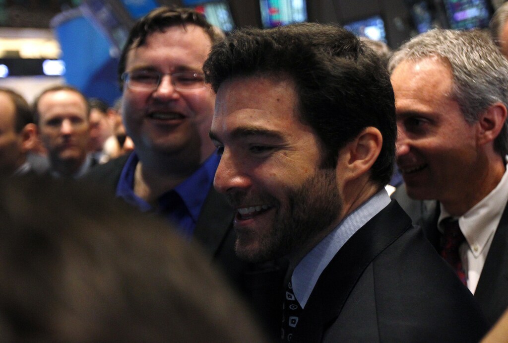 Founder of Linkedin Inc. Reid Garrett Hoffman (L) looks on with CEO Jeffrey Weiner (R) at a trading post as the price for their company's stock is set in an initial public offering (IPO) at the New York Stock Exchange in New York, May 19, 2011. REUTERS/Mike Segar (UNITED STATES - Tags: BUSINESS) - RTR2MMFZ
