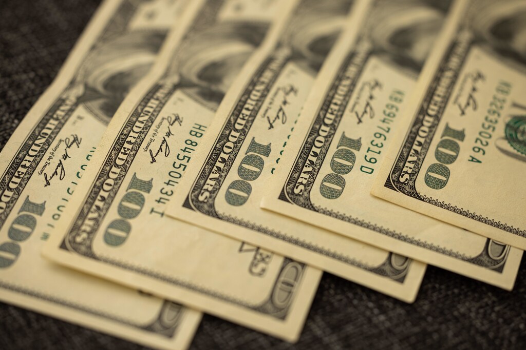 Multiple 100 dollar bills.