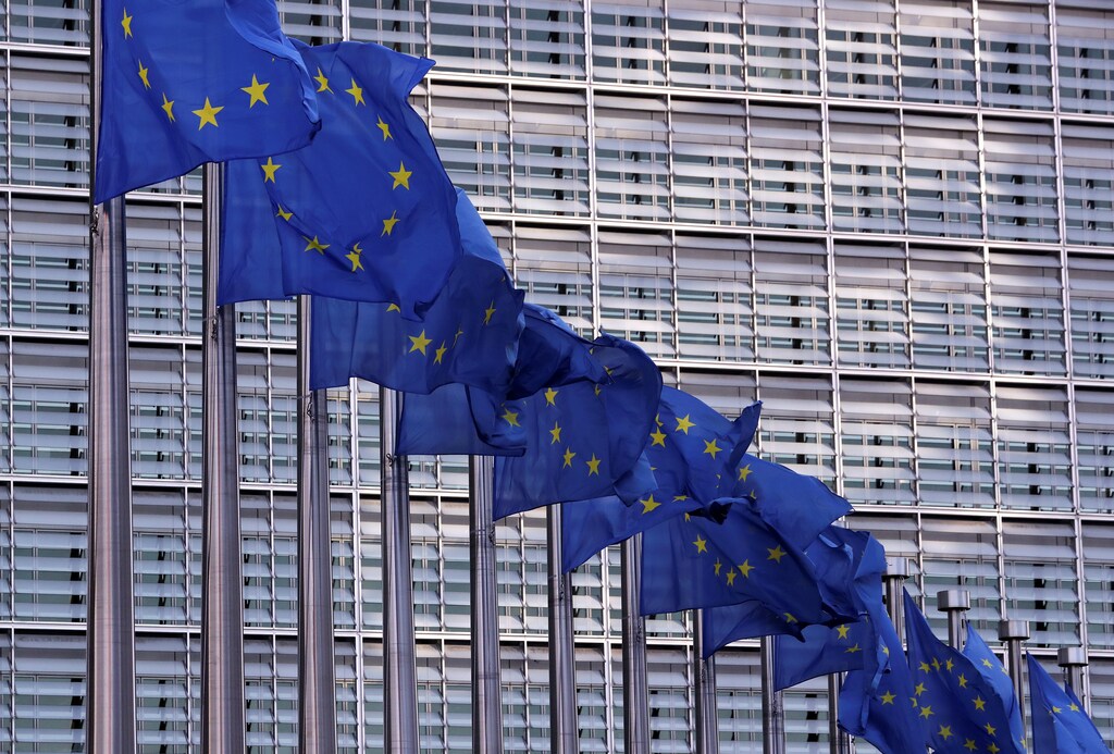 European Union flags fly outside the European Commission headquarters in Brussels, Belgium, February 19, 2020. Picture taken February 19, 2020 REUTERS/Yves Herman - RC274F9T78R4