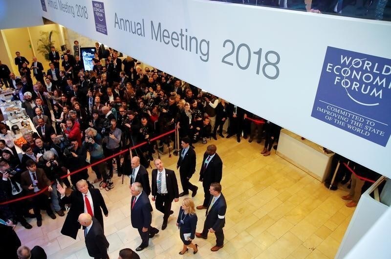 U.S. President Donald Trump waves as he arrives at the World Economic Forum (WEF) annual meeting in Davos, Switzerland January 26, 2018. REUTERS/Denis Balibouse - RC11BFC17740