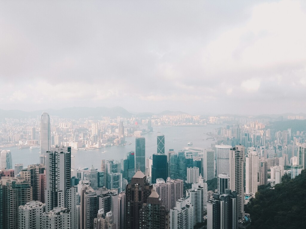 A city skyline of Hong Kong across a body of water: Asia's climate crisis is impacting productivity.