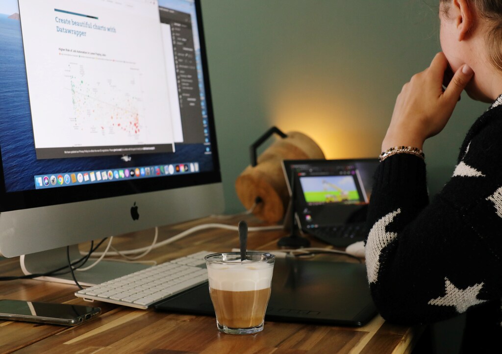 A woman works in a house while workers are forced to work from home and demand payback for extra home office costs during the coronavirus disease (COVID-19) outbreak in Sassenheim, Netherlands October 2, 2020. Picture taken October 2, 2020. REUTERS/Eva Plevier - RC2HDJ9PLBE3