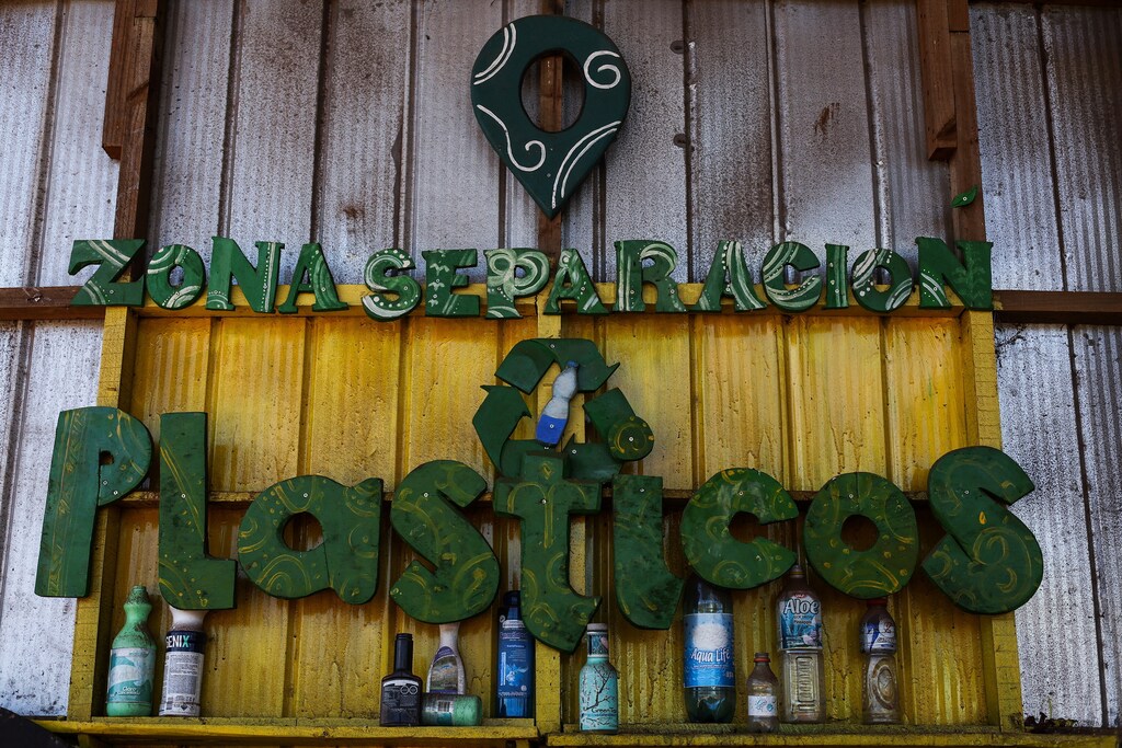 Words that read 'Plastic separation zone' are displayed inside Orito recycling plant in Easter Island, Chile September 30, 2024: Recycling rates in Latin America and the Caribbean remain low