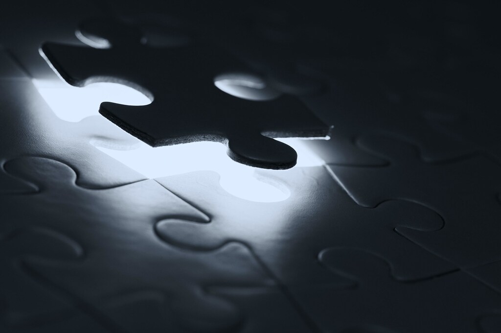 a puzzle piece falling into place, to represent the decision-making process of a machine