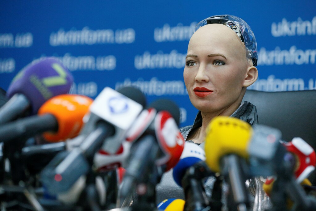 Social humanoid robot Sophia, a latest creation by Hanson Robotics company, attends a news conference after a meeting with young inventors and officials in Kiev, Ukraine October 11, 2018. REUTERS/Valentyn Ogirenko TPX IMAGES OF THE DAY - RC19B71A1060