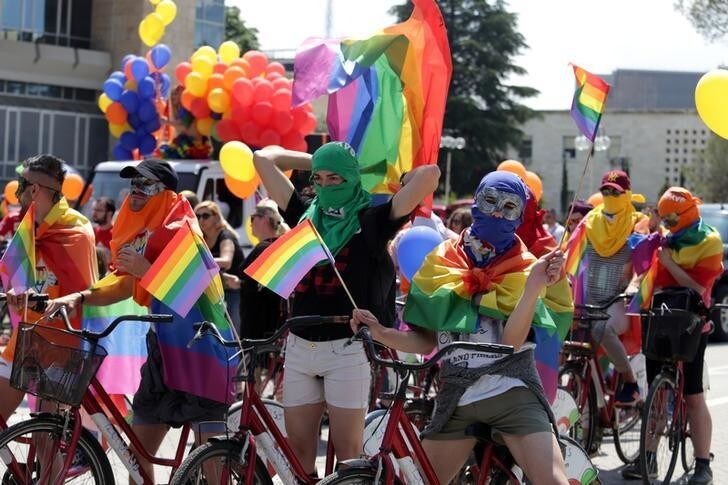 LGBT rights activists react during the Tirana Gay (P)Ride in Tirana Albania May 13, 2018.