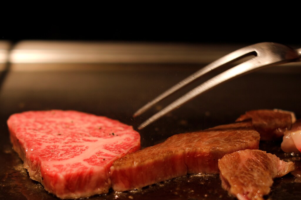 A Kobe beef steak is seen in a grill in Osaka, Japan, June 30, 2019. Picture taken June 30, 2019. REUTERS/Jorge Silva