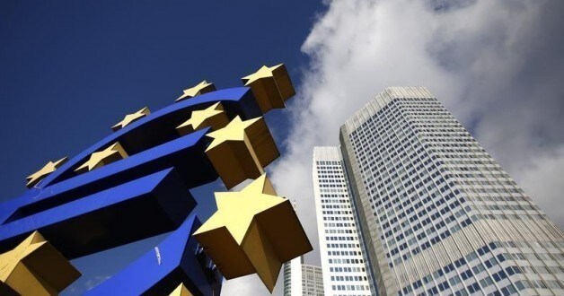 The Euro currency sign is seen next to the European Central Bank (ECB) headquarters in Frankfurt November 6, 2012. The European Central Bank is set to leave interest rates unchanged on Thursday, deferring a cut in borrowing costs that would risk undermining the impact of Mario Draghi's signature policy a year into his ECB presidency. A raft of weak economic data support the case for cutting rates but to do so could stir up debate in Germany about the ECB going soft under Draghi and blunt the impact of his new bond-purchase plan, dubbed Outright Monetary Transactions (OMT).