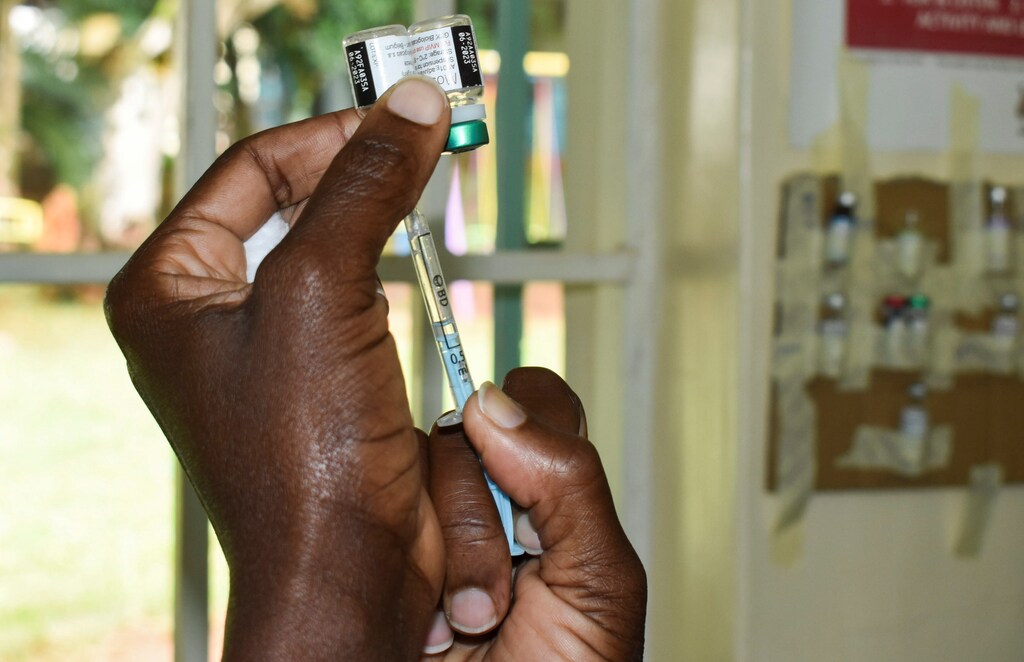 Pamela Omboko, a nurse prepares a vaccine against Malaria for infants at the Yala Sub County Hospital Mother and Child Healthcare (MCH) clinic in Gem, Siaya County, Kenya October 7, 2021. REUTERS/James Keyi - RC205Q9PZ239