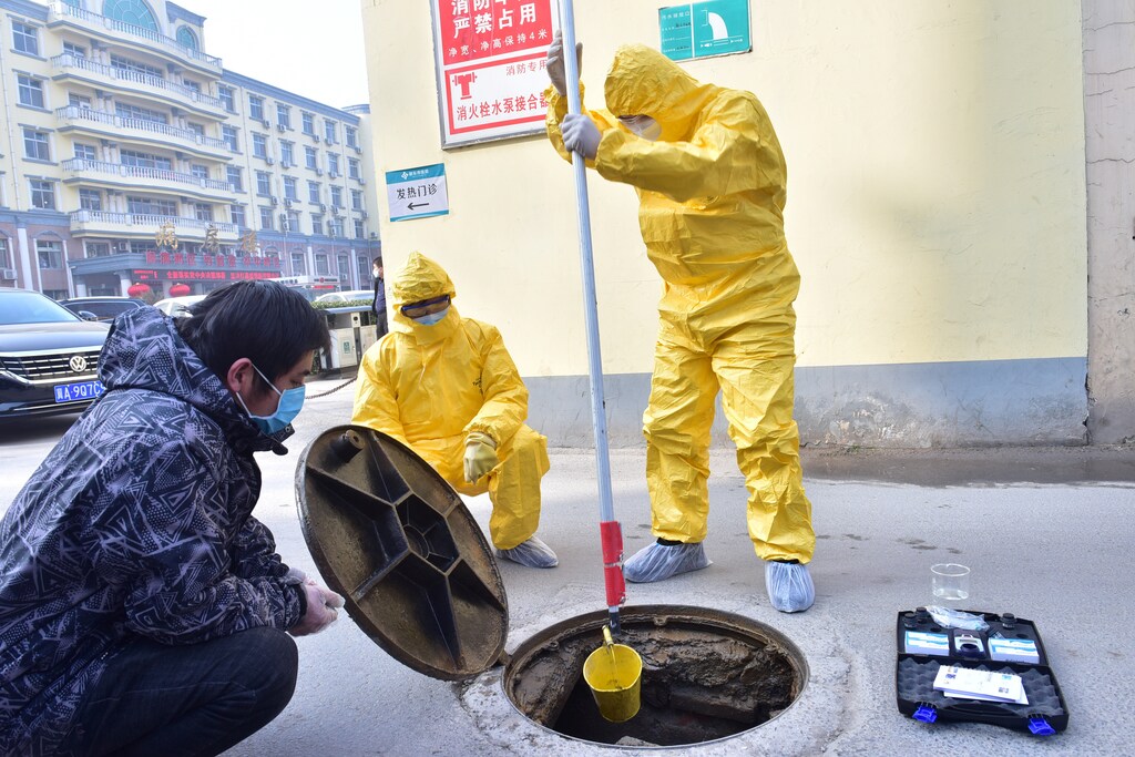 Workers of the ecology and environment bureau collect samples from the sewage system of a hospital following an outbreak of the novel coronavirus in the country, in Xinle, Hebei province, China February 8, 2020. Picture taken February 8, 2020