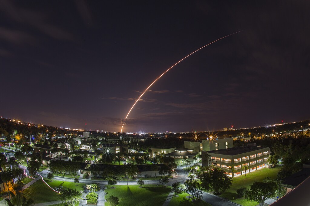 A United Launch Alliance Atlas V 551 rocket blasts off from Cape Canaveral Air Force Station in Florida, January 20, 2015. The unmanned rocket blasted off with a next-generation communications satellite designed to provide cellular-like voice and data services to U.S. military forces around the world. Picture taken using long exposure, looking over the campus of Florida Institute of Technologies in Melbourne, about 40 miles from the launch pad. REUTERS/Michael Brown (UNITED STATES - Tags: SCIENCE TECHNOLOGY MILITARY TPX IMAGES OF THE DAY) - GM1EB1L0SXU01