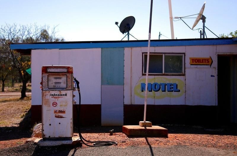 A disused petrol pump can be seen outside the Cooladdi Post Office and motel, located in the town of Cooladdi in south-western Queensland, Australia, August 14, 2017. Picture taken August 14, 2017. REUTERS/David Gray - RC133608A510