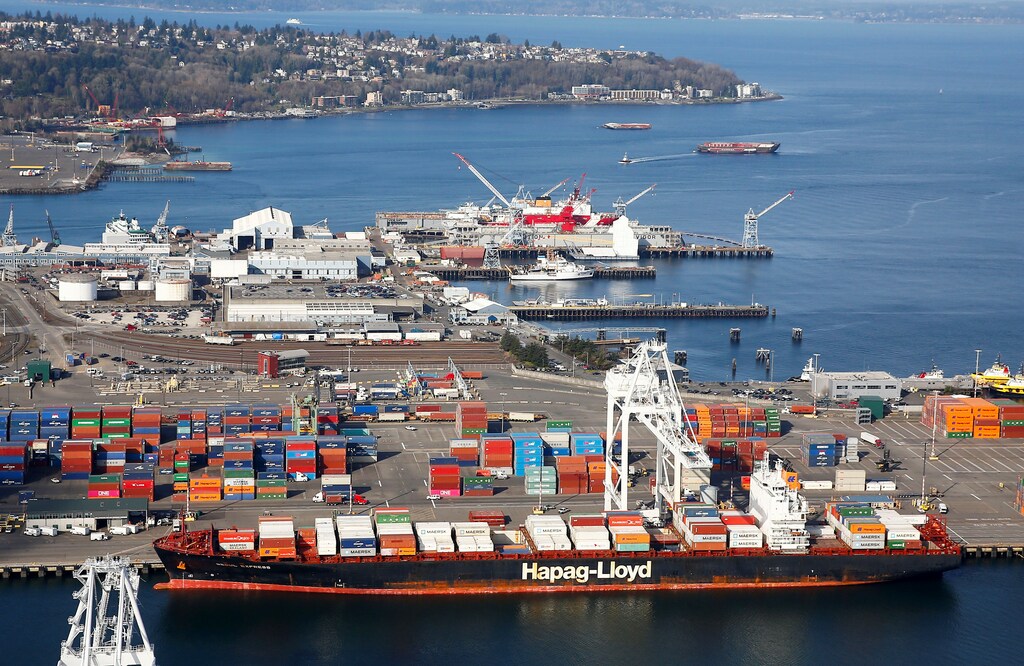 An aerial photo shows the Seoul Express container ship, registered in Germany, docked at Harbor Island at the Port of Seattle in Seattle, Washington, U.S. March 21, 2019. Picture taken March 21, 2019. REUTERS/Lindsey Wasson - RC14E5B326C0