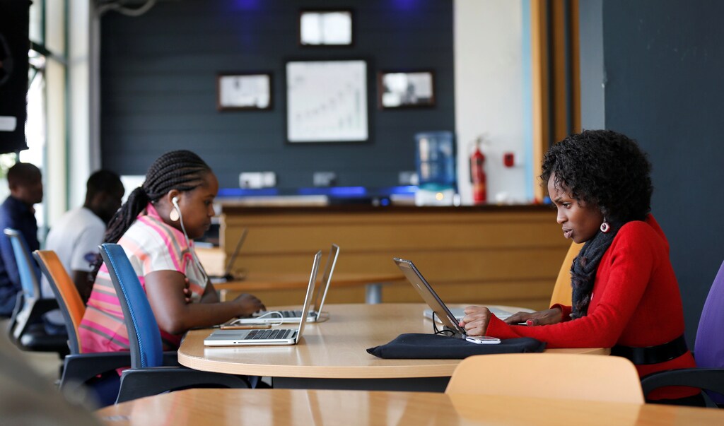 Entrepreneurs work on their projects at Nailab, a Kenyan firm that supports technology startups, behind the latest initiative, which targets entrepreneurs for their ideas on providing sex education through technology and social media in Nairobi, Kenya, July 4, 2016. REUTERS/Thomas Mukoya - RTX2JKNZ