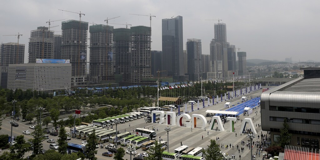 A big sign of "Big Data" is seen outside the venue of the 2015 Big Data Expo, near residential buildings under construction, in Guiyang, Guizhou province, China, May 26, 2015. Picture taken May 26, 2015.