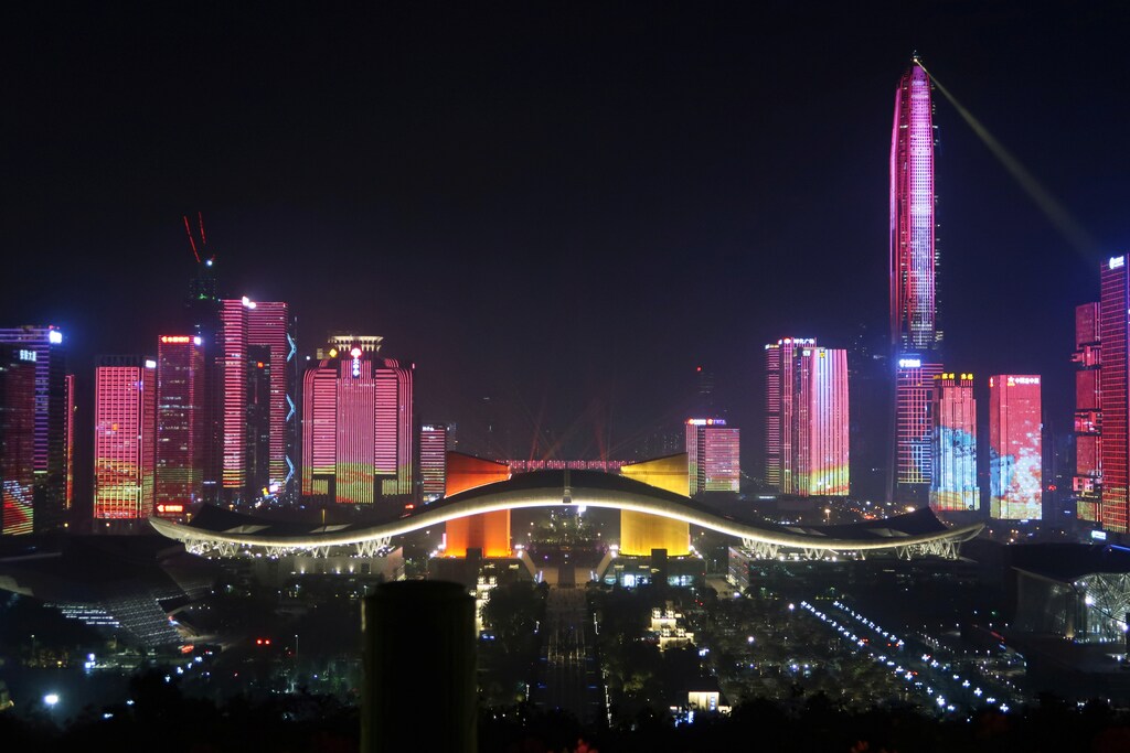 The central business area that lit up during a light show is seen ahead of the 40th anniversary of China's reform and opening up in Shenzhen, Guangdong province, China December 4, 2018. Picture taken December 4, 2018. To match INSIGHT CHINA-ANNIVERSARY/REFORM-WORKERS REUTERS/Thomas Suen - RC1AE7162040
