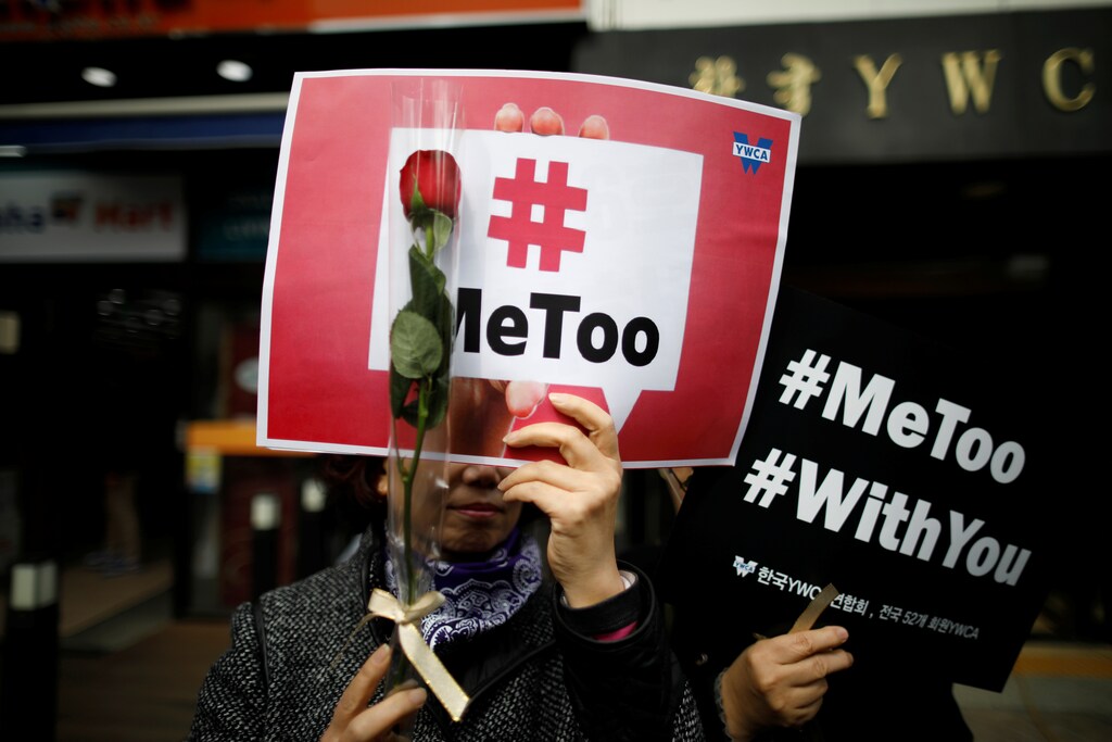 Women attend a protest as a part of the #MeToo movement on International Women's Day in Seoul, South Korea, March 8, 2018. REUTERS/Kim Hong-Ji - RC18911A4170
