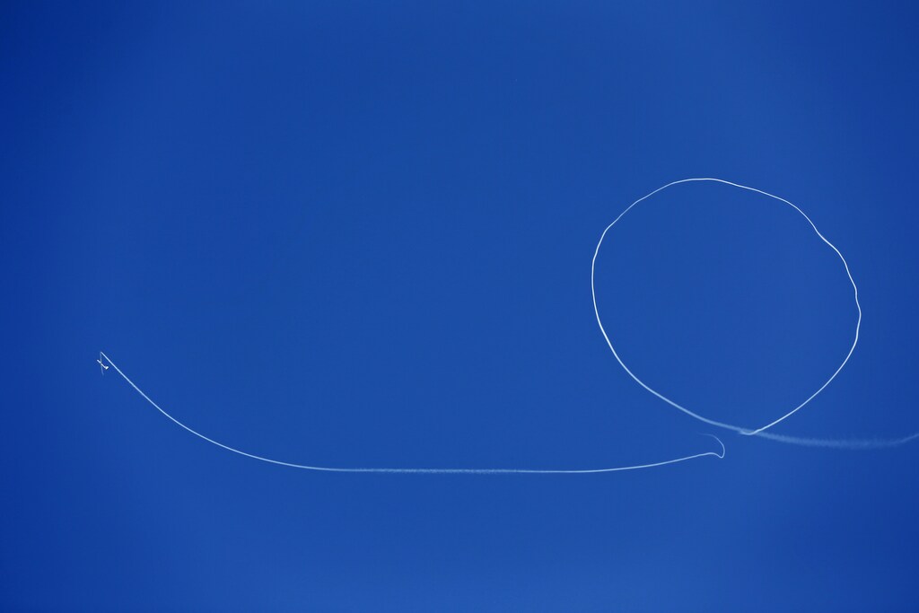 A member of Romania's Airclub performs on a glider during Bucharest International Air Show at Baneasa airport in Bucharest June 22, 2014. REUTERS/Bogdan Cristel (ROMANIA - Tags: TRANSPORT SOCIETY) - GM1EA6M1LPN01