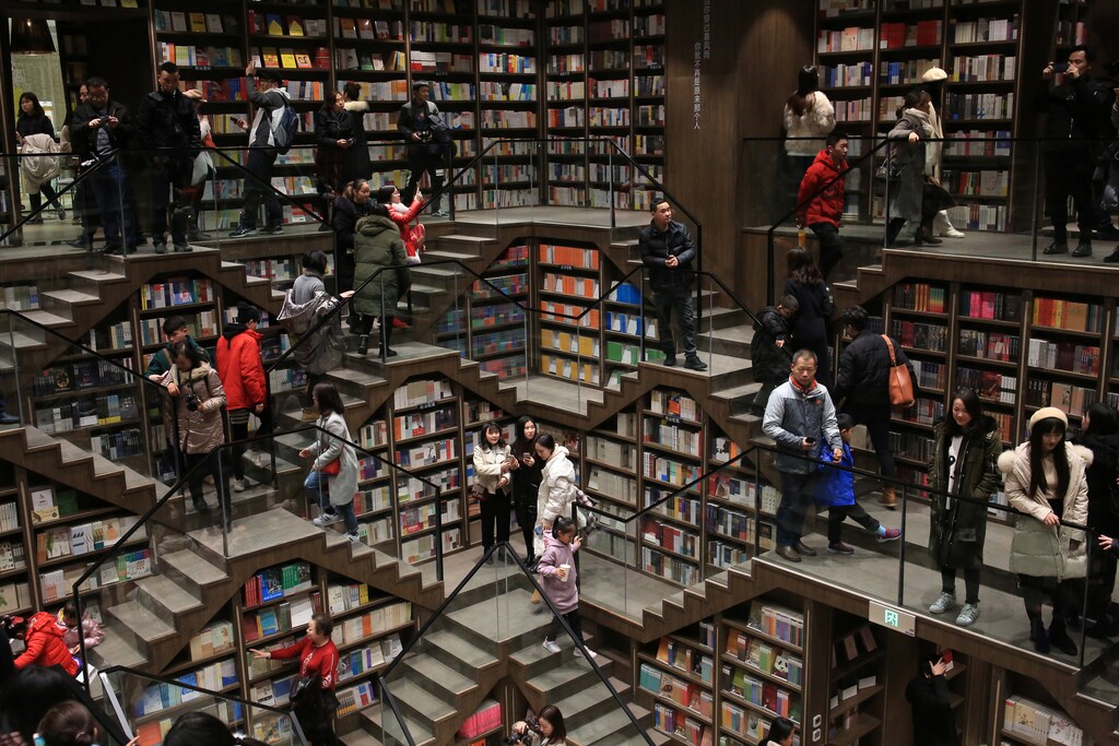 Visitors are seen inside a newly opened bookstore in Chongqing, China January Coronavirus china virus health healthcare who world health organization disease deaths pandemic epidemic worries concerns Health virus contagious contagion viruses diseases disease lab laboratory doctor health dr nurse medical medicine drugs vaccines vaccinations inoculations technology testing test medicinal biotechnology biotech biology chemistry physics microscope research influenza flu cold common cold bug risk symptomes respiratory china iran italy europe asia america south america north washing hands wash hands coughs sneezes spread spreading precaution precautions health warning covid 19 cov SARS 2019ncov wuhan sarscow wuhanpneumonia pneumonia outbreak patients unhealthy fatality mortality elderly old elder age serious death deathly deadly