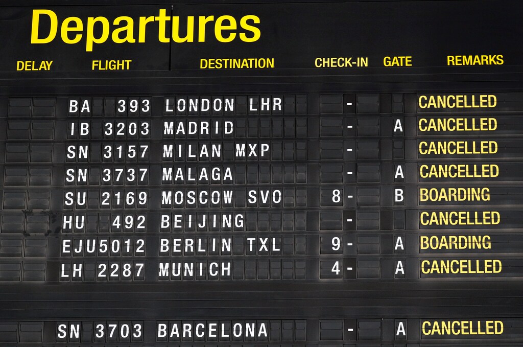 A flight information board displays cancelled flights, at Zaventem International Airport near Brussels, after Belgium imposed a lockdown to slow down the spread of the coronavirus disease (COVID-19), Belgium, March 19, 2020. REUTERS/Francois Lenoir - RC2ZMF97L1TS