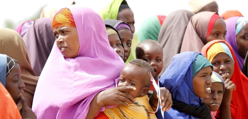 Somali refugees wait to see the United Nations High Commissioner for Refugees (UNHCR) Antonio Guterres at the Ifo camp in Dadaab near the Kenya-Somalia border
