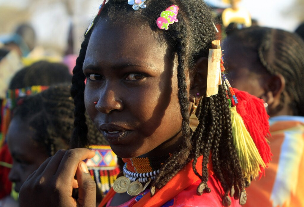 A member of the Kenana Arab tribe looks on during a tribal dance performance after ballot boxes were sealed on the last day of voting, at Galayat locality in South Kordofan State May 4, 2011. Sudanese voted on Monday in delayed elections in the north's main oil state, a poll that analysts fear could provoke violence in the countdown to the secession of the country's south in July. The governorship vote in Southern Kordofan has also grabbed world attention because the candidate for the north's ruling party is Ahmed Haroun, a man wanted by the International Criminal Court over charges of war crimes in Darfur. REUTERS/Mohamed Nureldin Abdallah (SUDAN - Tags: ELECTIONS POLITICS) - GM1E7550J6M01
