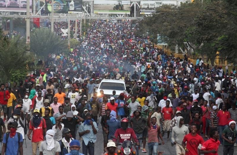 Demonstrators participate in an anti-government protest in Port-au-Prince, Haiti, February 12, 2019. REUTERS/Jeanty Junior Augustin - RC1A5C07F650