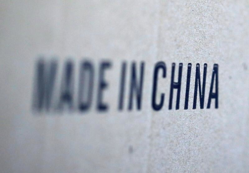 Words 'Made in China' are pictured on a box of products imported from China at a wholesale shop in Paris, France, August 10, 2018.