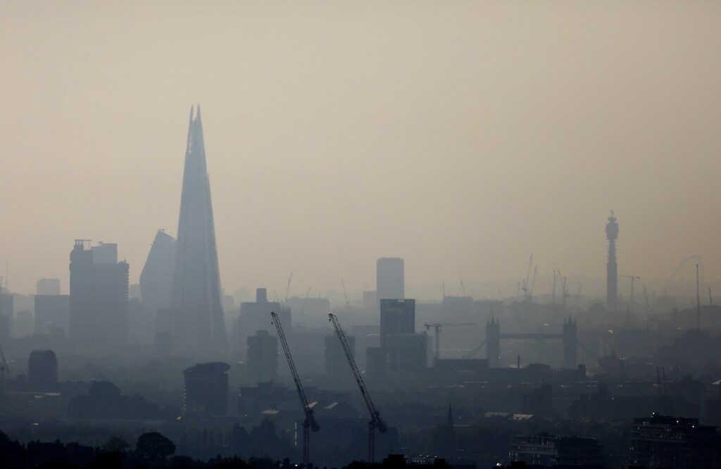 The Shard, Tower Bridge and the BT Tower are seen through a heat haze in London, Britain, May 6, 2018. REUTERS/Kevin Coombs - RC1BDB341F30