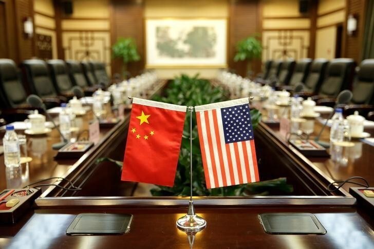 Flags of U.S. and China are placed for a meeting between Secretary of Agriculture Sonny Perdue and China's Minister of Agriculture Han Changfu at the Ministry of Agriculture in Beijing, China June 30, 2017. REUTERS/Jason Lee